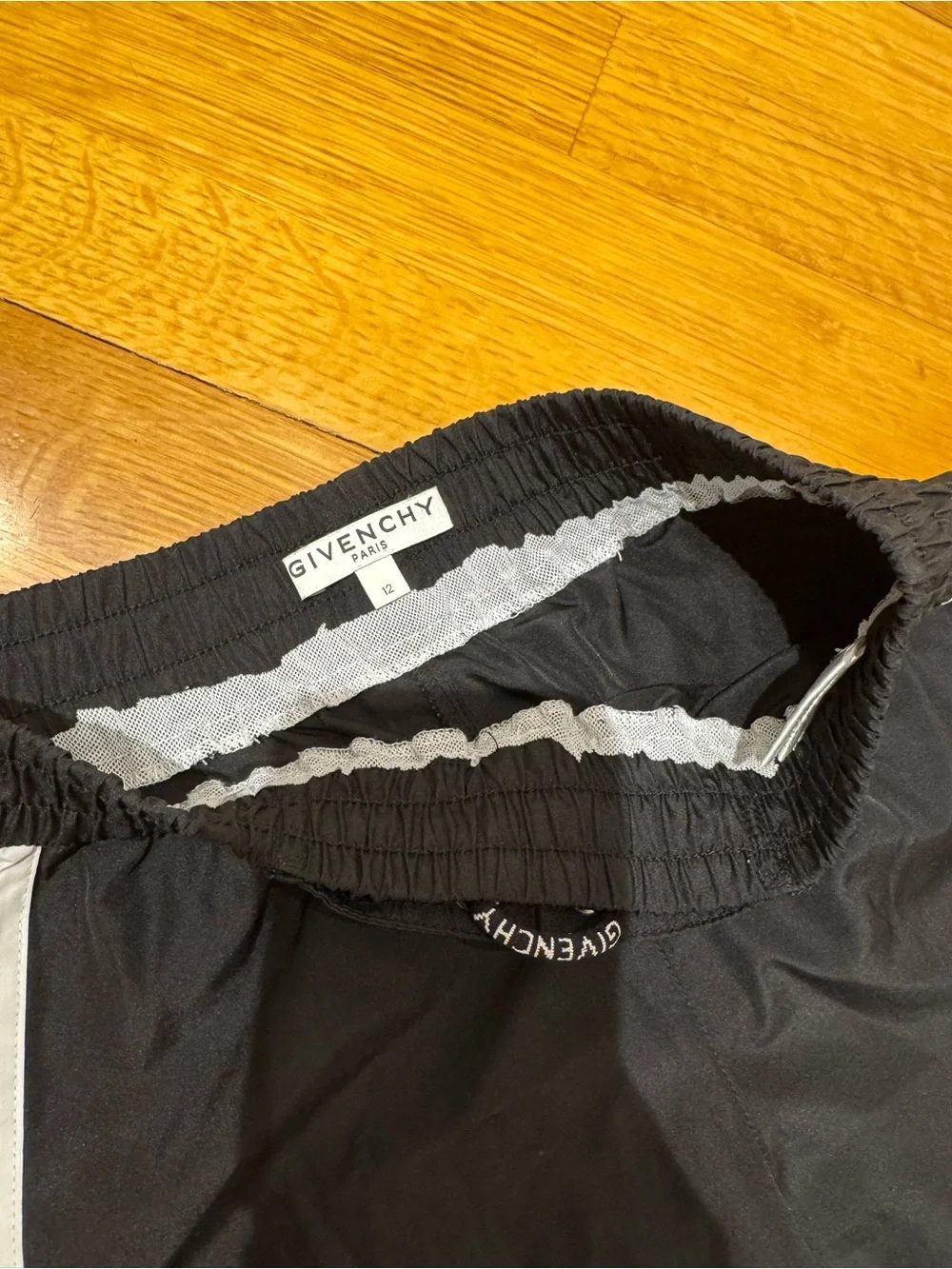 4 pairs of swim shorts Kids Graphic and Solid swim Shorts Pack - size 12